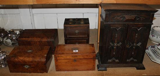 Carved oak cabinet, another & 3 various caddies & writing boxes